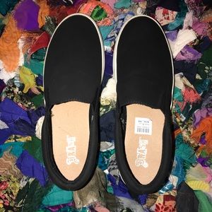 Black platform sneakers